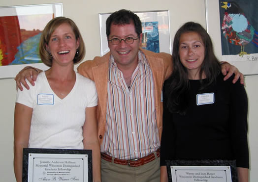 Seth Pollak congratulates award winners Alison Wismer Fries and Sandra Klein